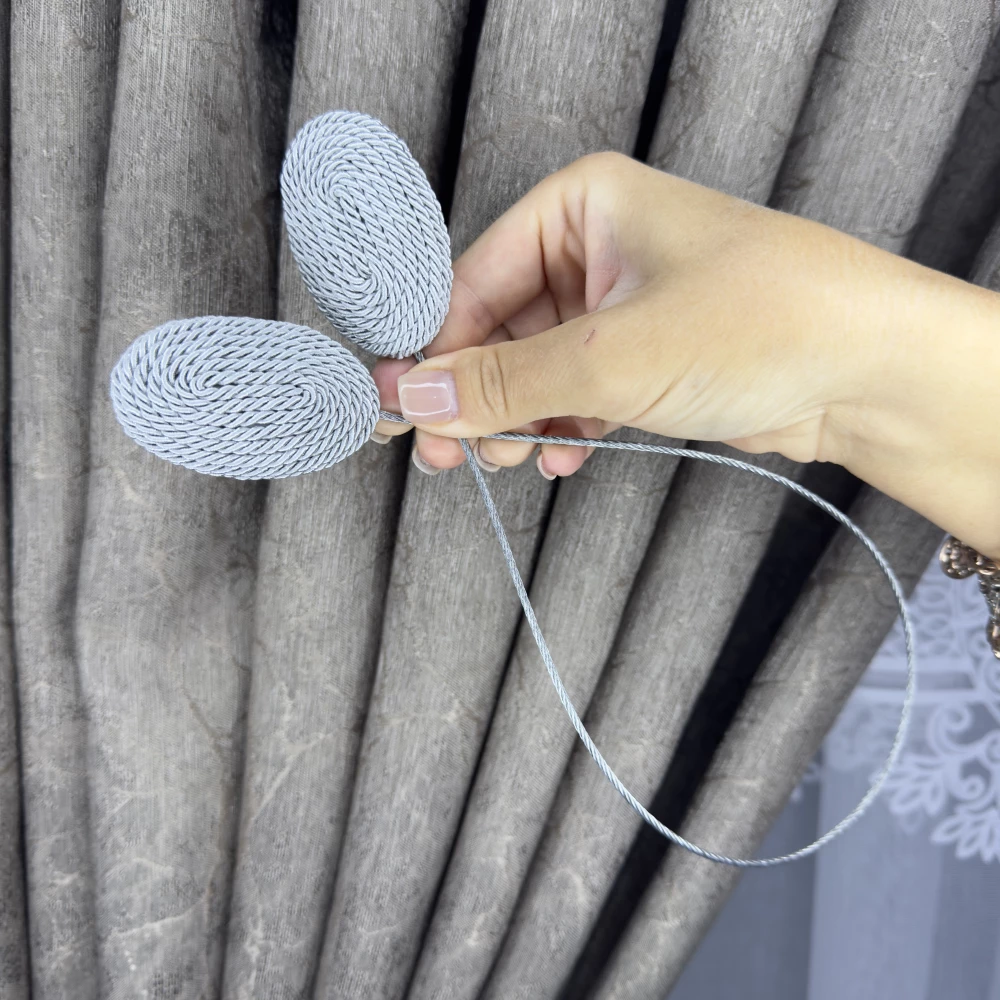 Магніт-підхват для тюля, з металевим тросом сірий